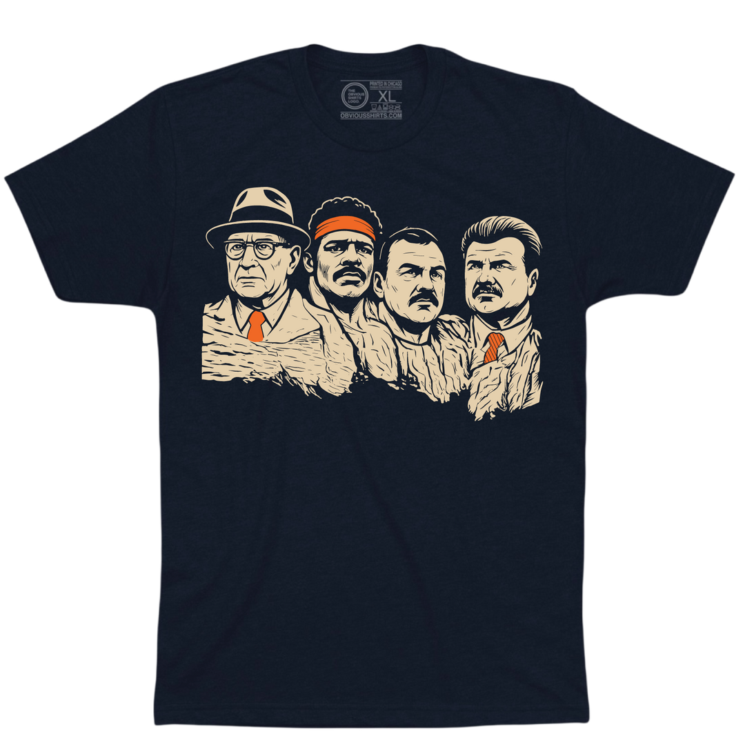 Navy Monsters of the Mountain T-shirt with four illustrated portraits in a Mount Rushmore-style design.