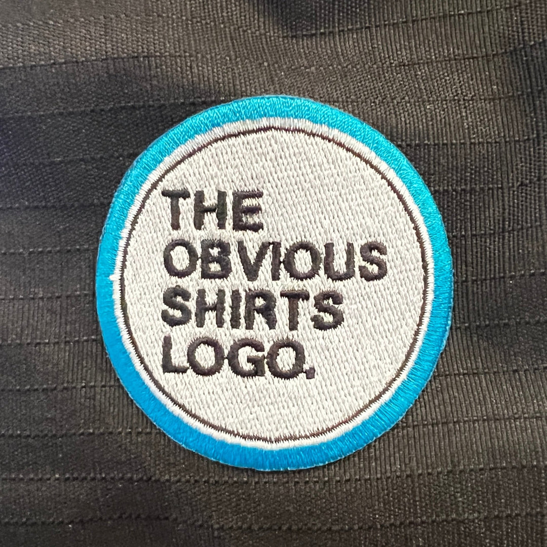OBVIOUS SHIRTS EMBROIDERED LOGO PATCH. - OBVIOUS SHIRTS